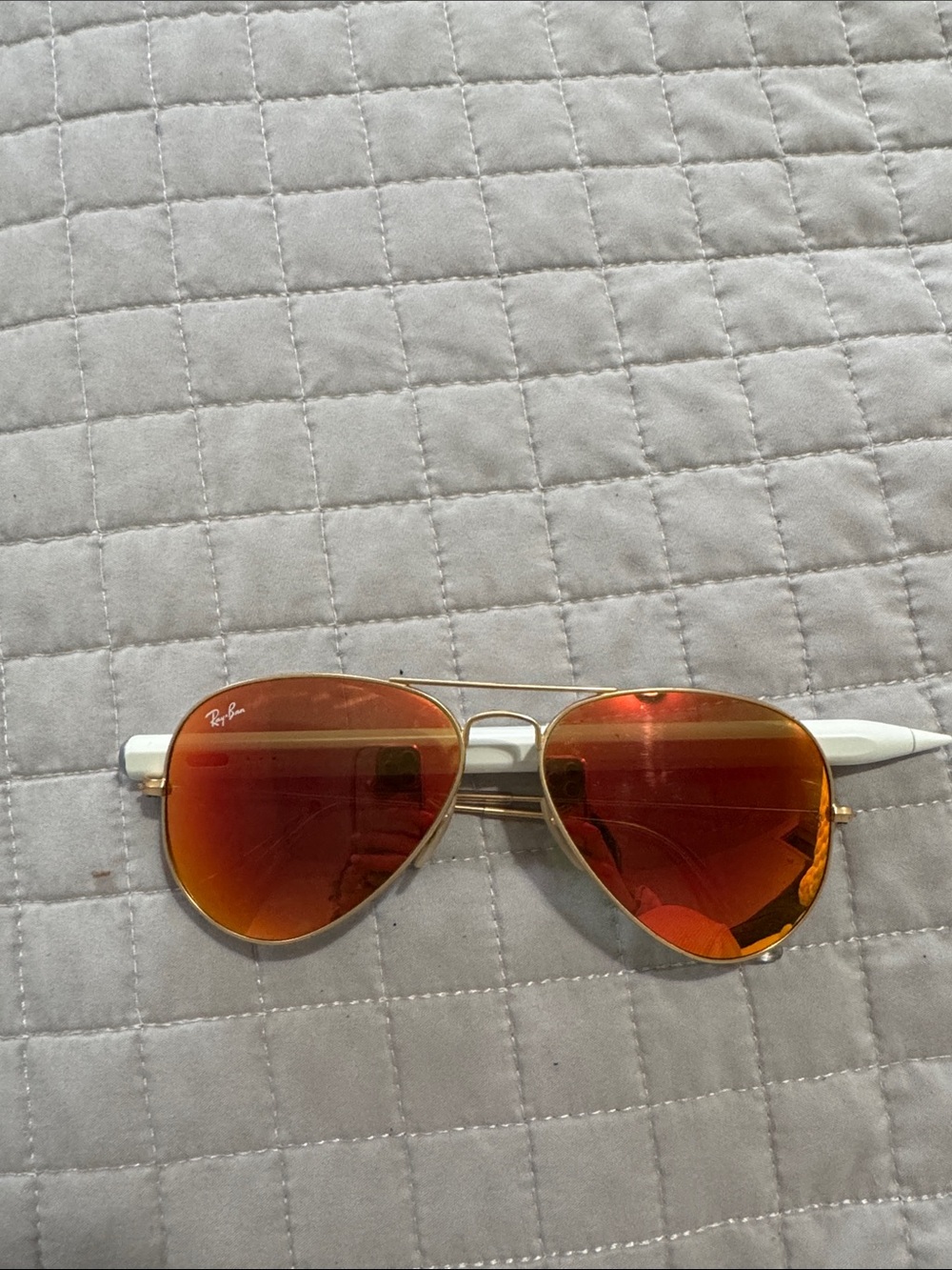 Ray-Ban Gold Frame Sunglasses with Red-Orange Mirrored Lenses and White Temples